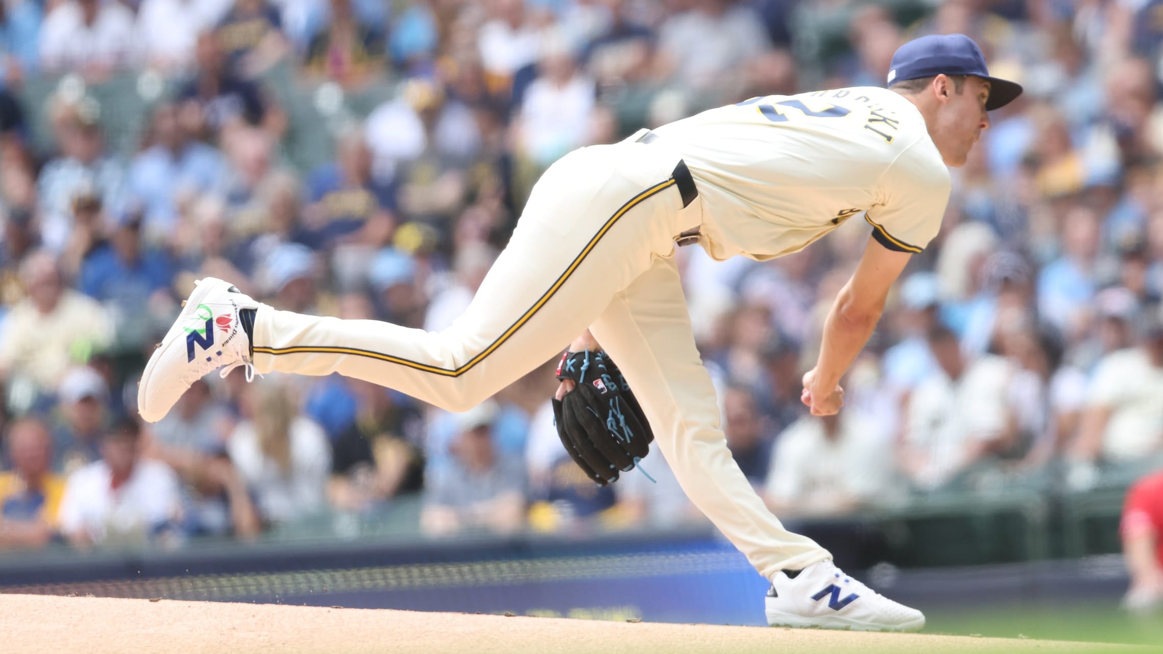 Jacob Misiorowski pitches while wearing custom cleats