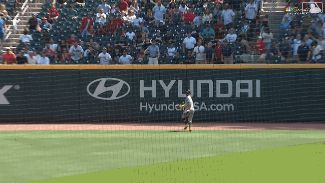 An animated gif of Denzel Clarke robbing a home run