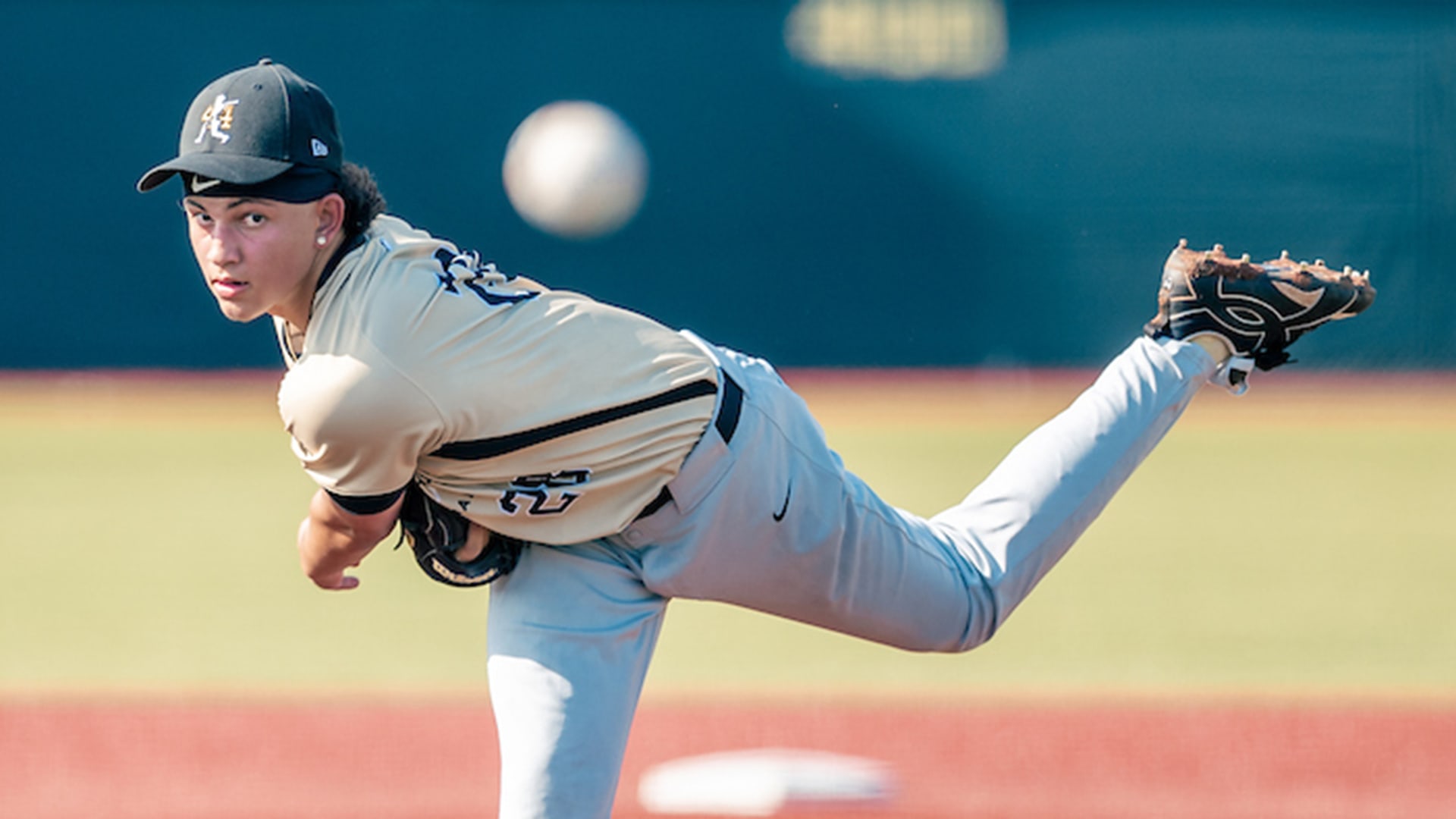 An MLB Develops prospect throws a pitch