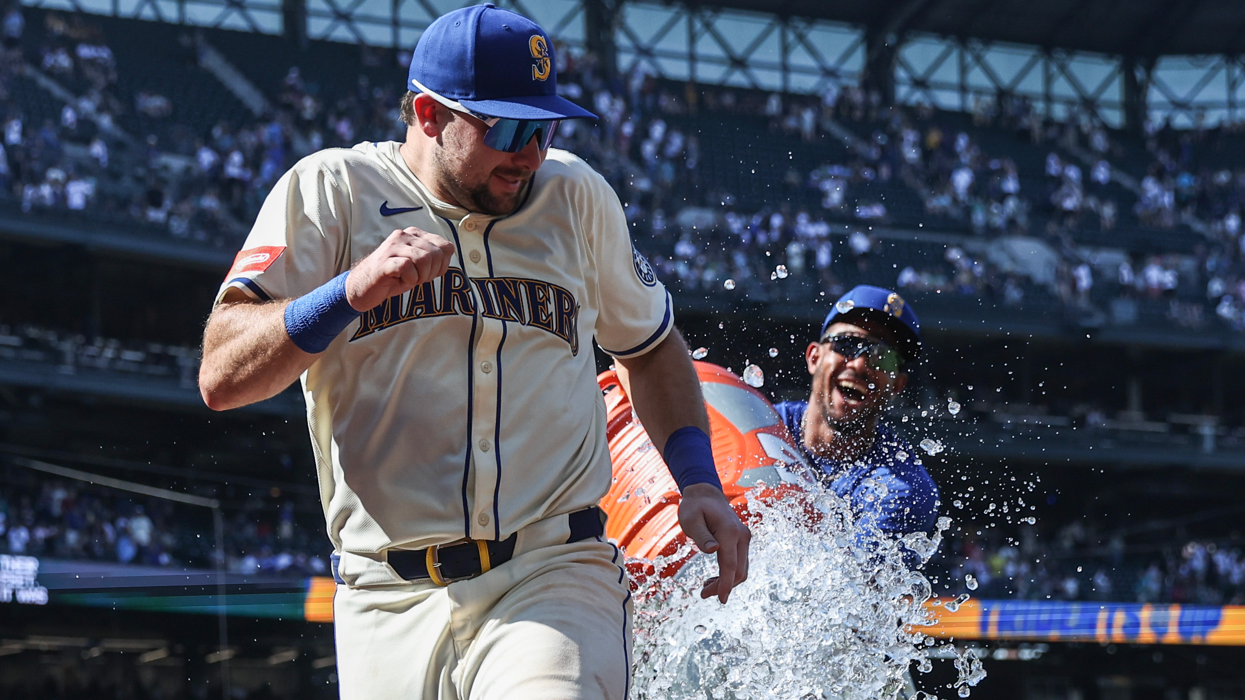 Cal Raleigh gets doused after the game