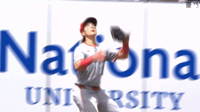 Stuart Fairchild soars over the wall to rob a home run