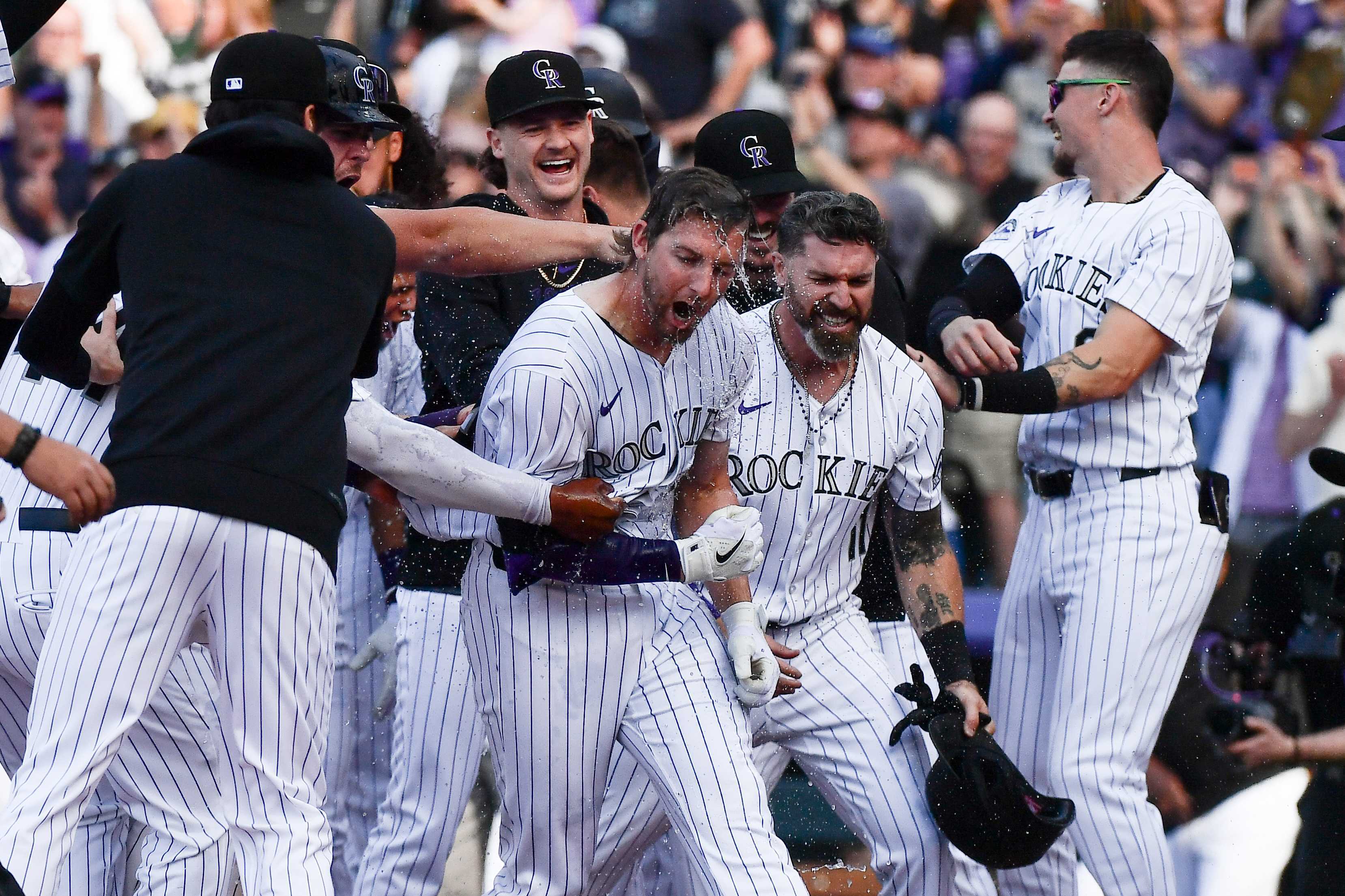 Ryan McMahon is doused following his walk-off grand slam