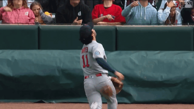 An animated gif of Marcelo Mayer making a sliding catch