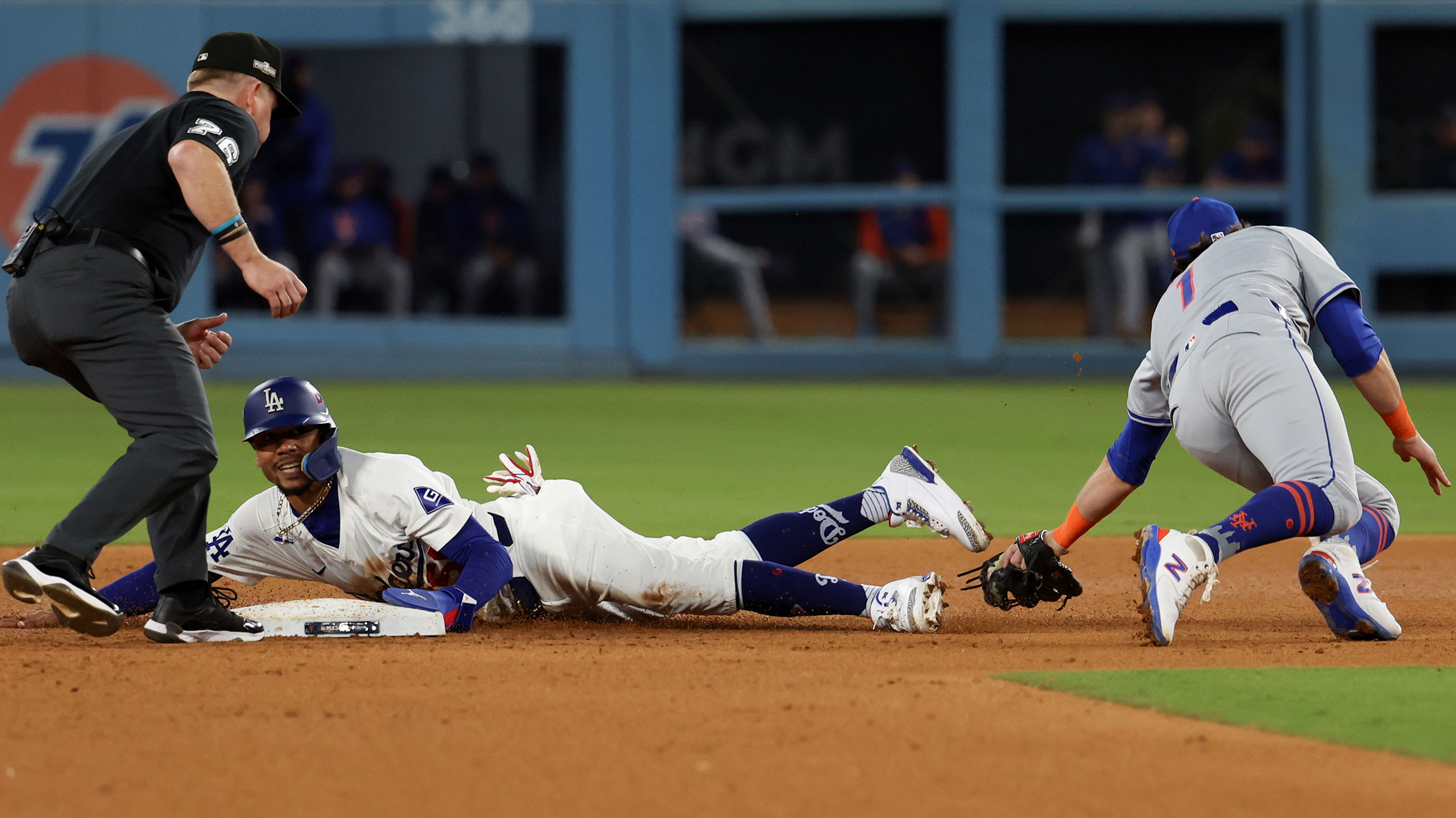 Mookie Betts steals second base