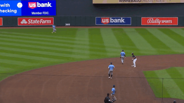 Jose Siri throws to third on the fly for an out