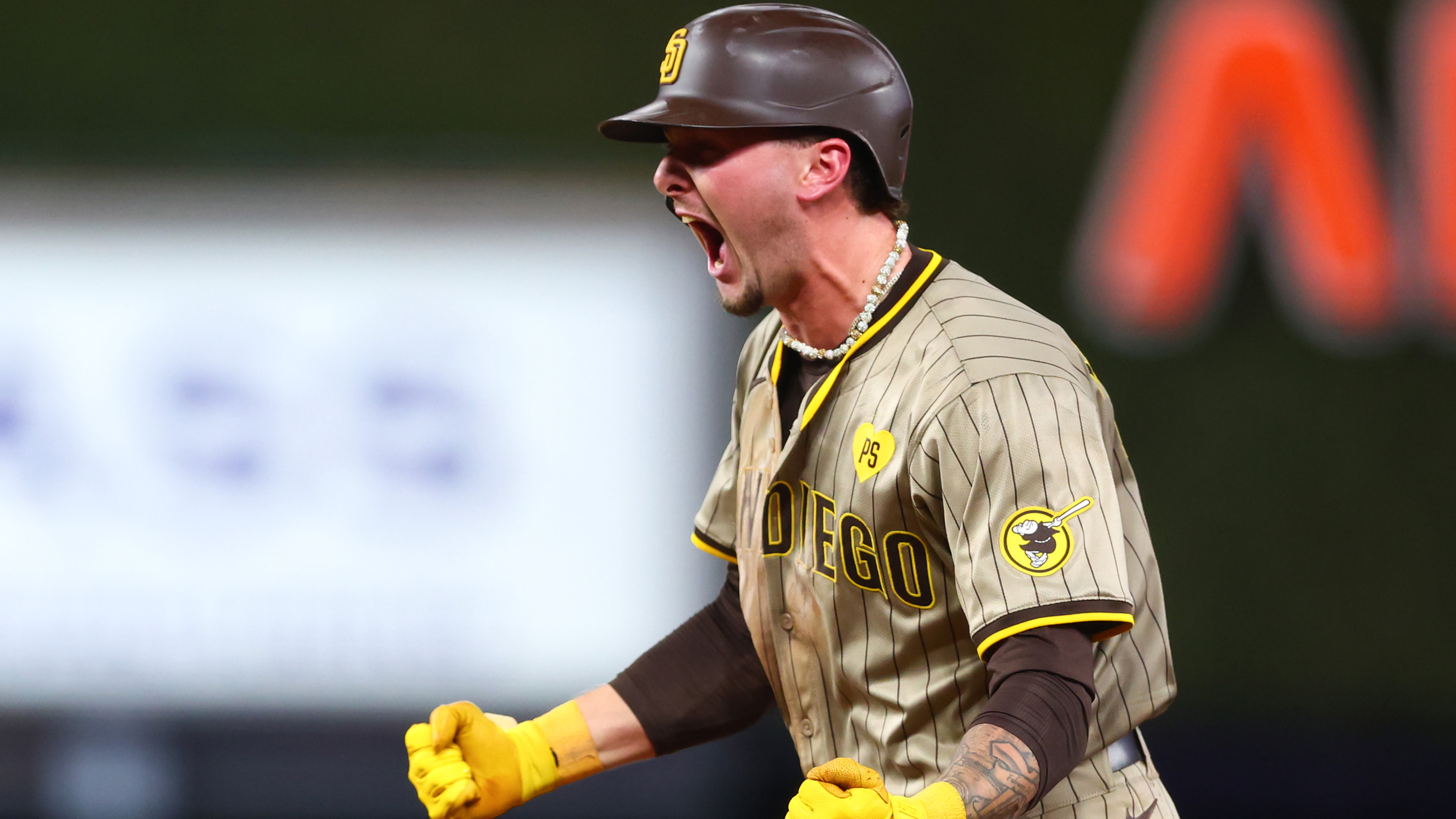 Jackson Merrill celebrates after hitting a home run in the ninth inning