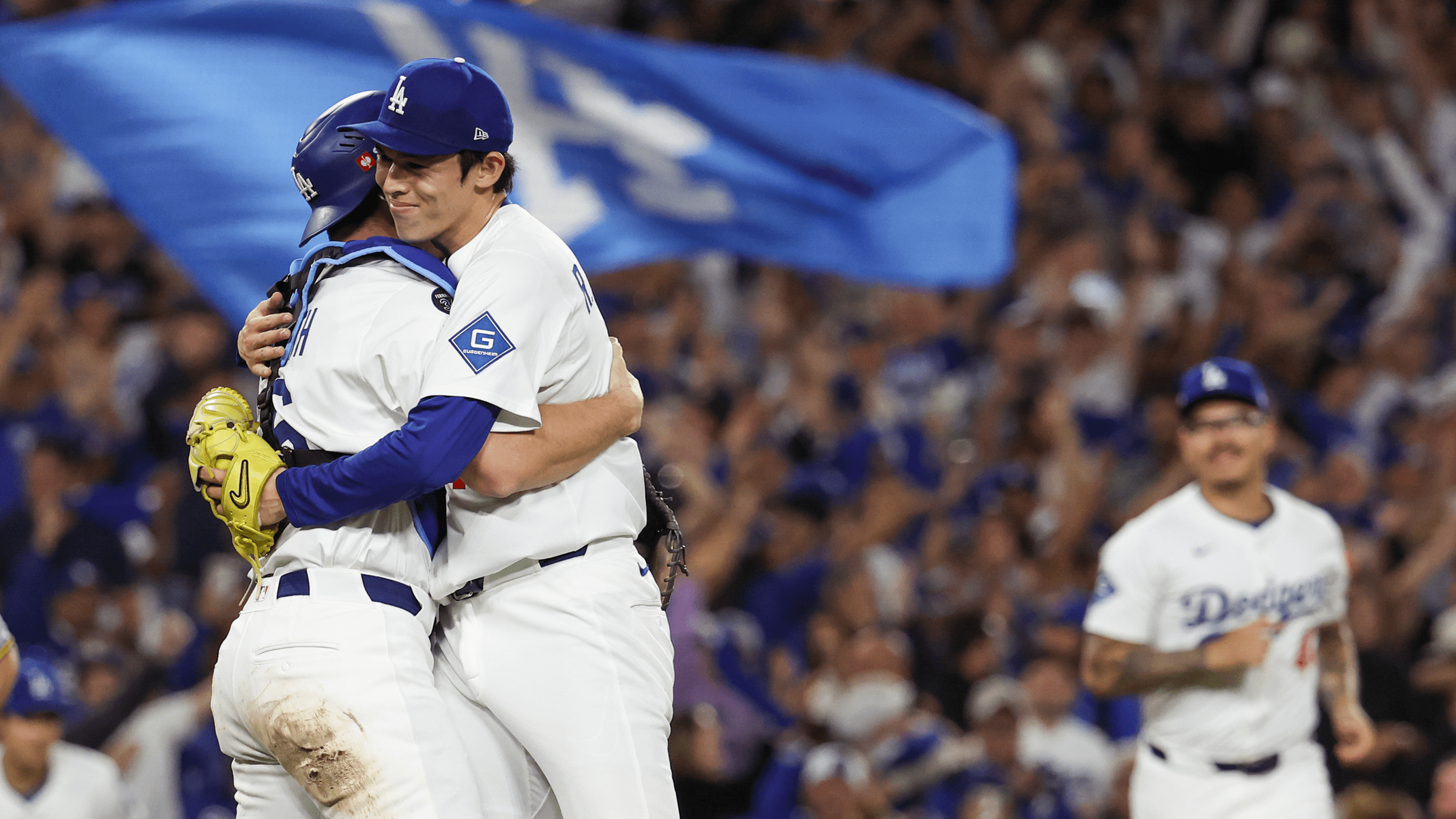 Will Smith and Roki Sasaki embrace after clinching the NLCS