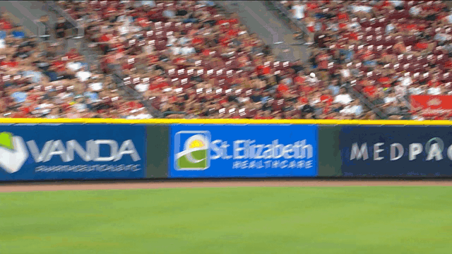 An animated gif of Austin Hays making a diving catch