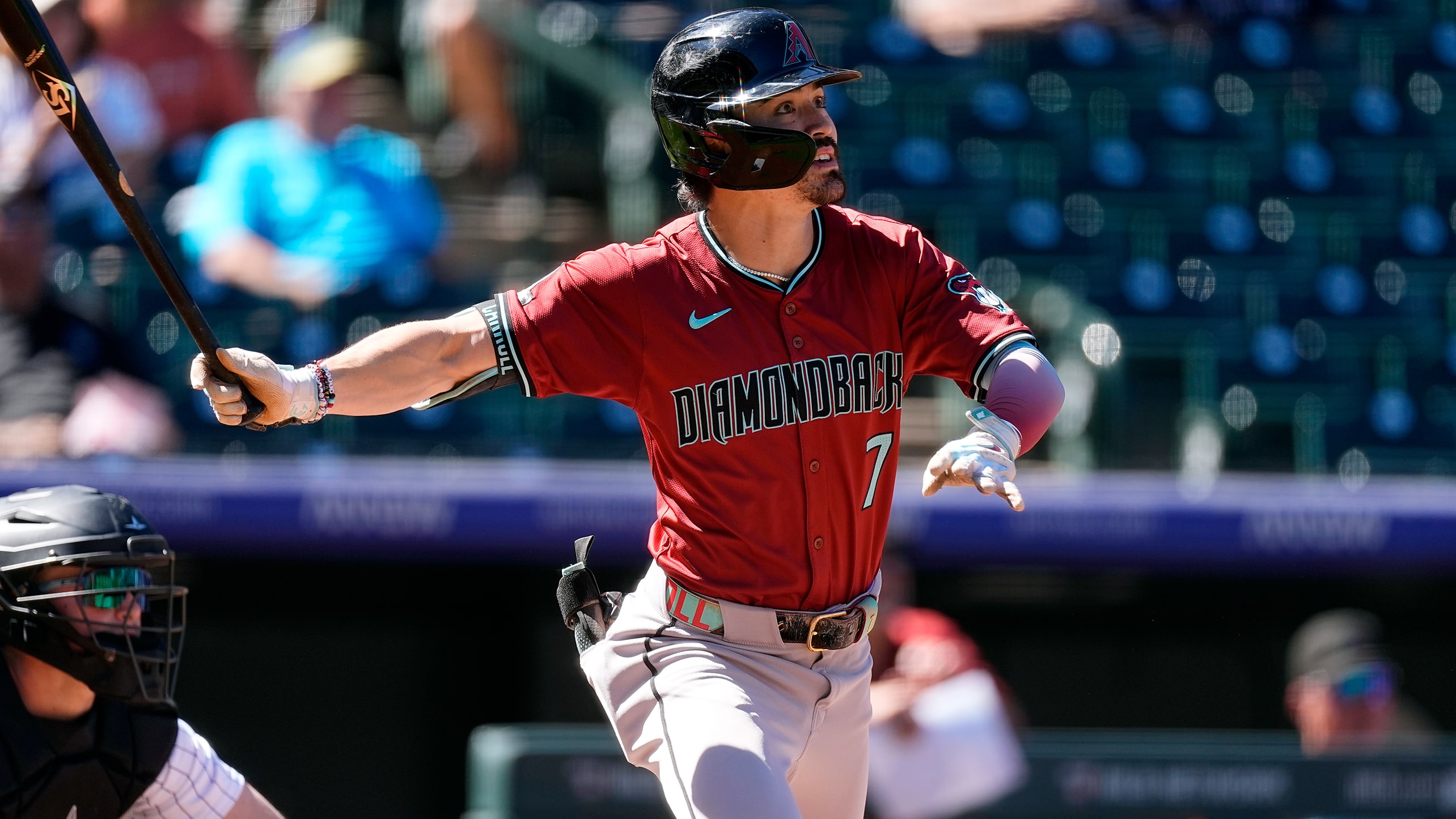 Corbin Carroll watches the first of his two homers yesterday in Colorado