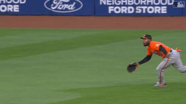 An animated gif of Cedric Mullins making a diving catch
