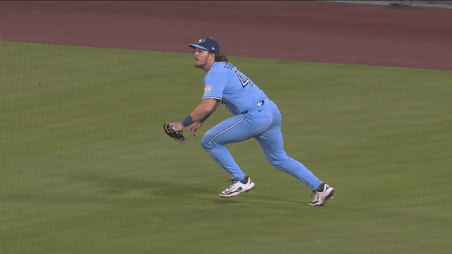 An animated gif of Addison Barger making a diving catch in right field