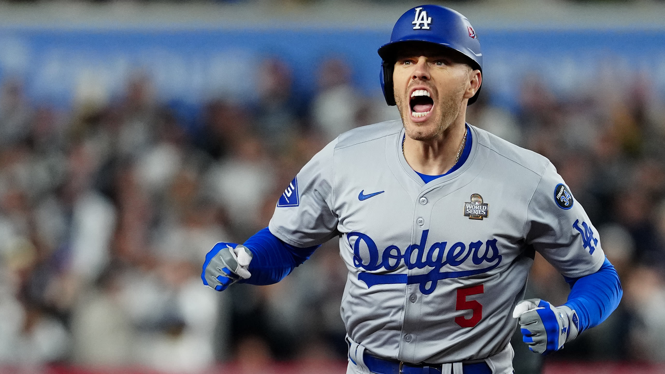 Freddie Freeman shouts as he rounds the bases