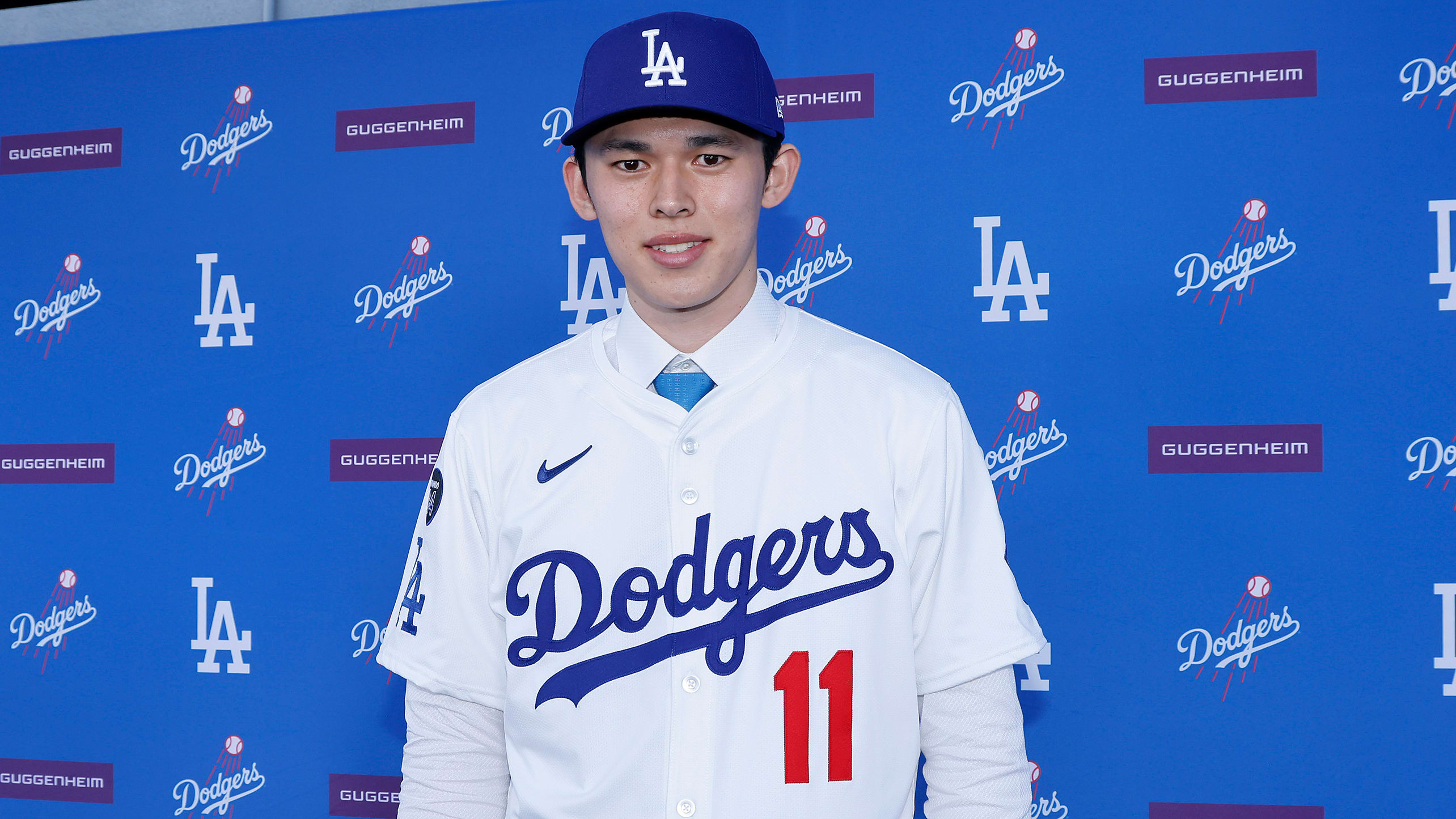 Roki Sasaki donned his No. 11 Dodgers jersey at his introductory press conference