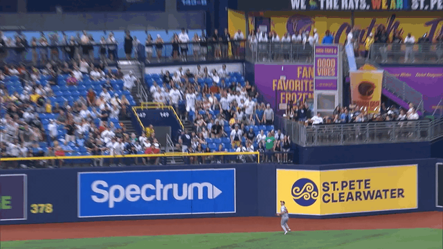 An animated gif of Jacob Young making a catch against the wall