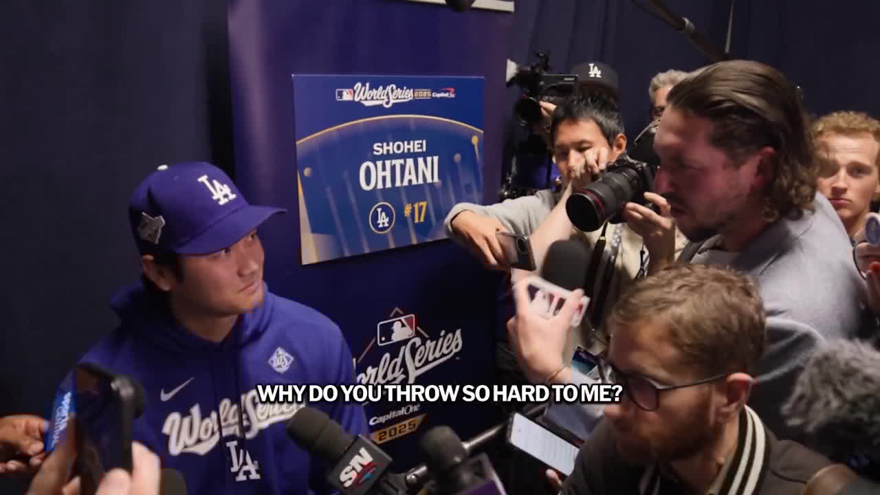 A screen grab of Vinnie Pasquantino asking Shohei Ohtani 'Why do you throw so hard to me?'