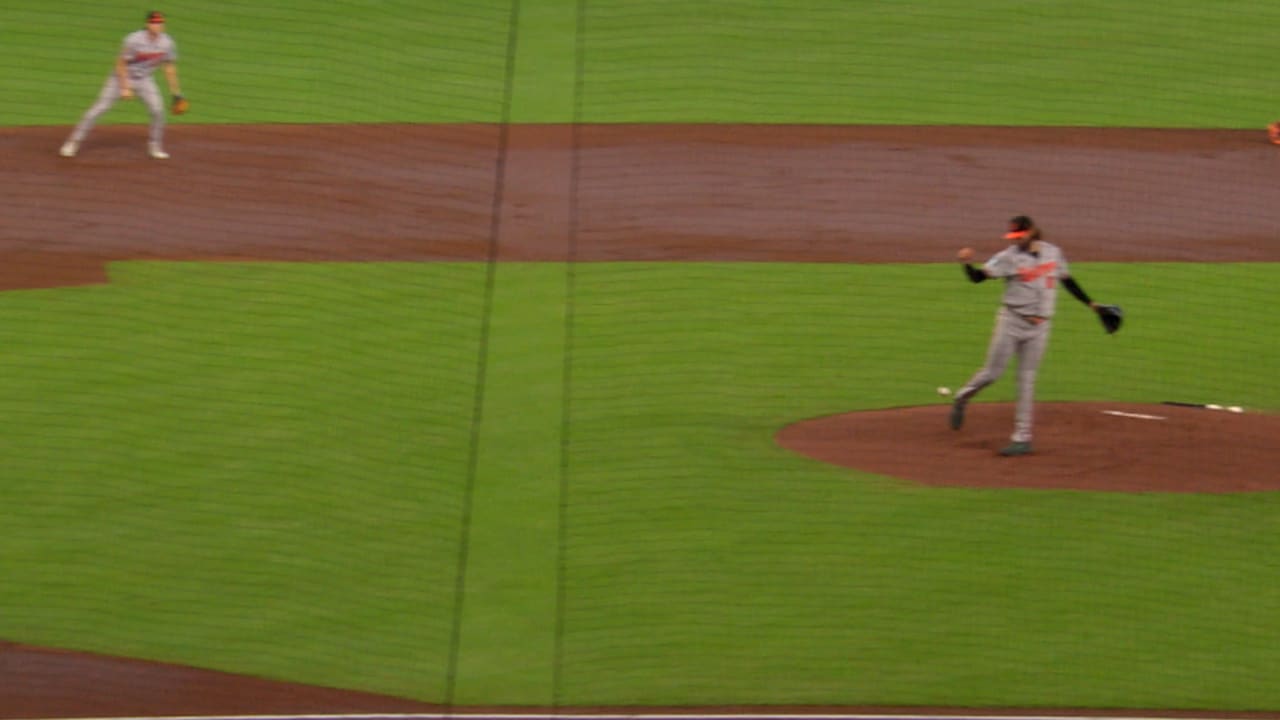 A screengrab of Brandon Young kicking a ground ball in the air