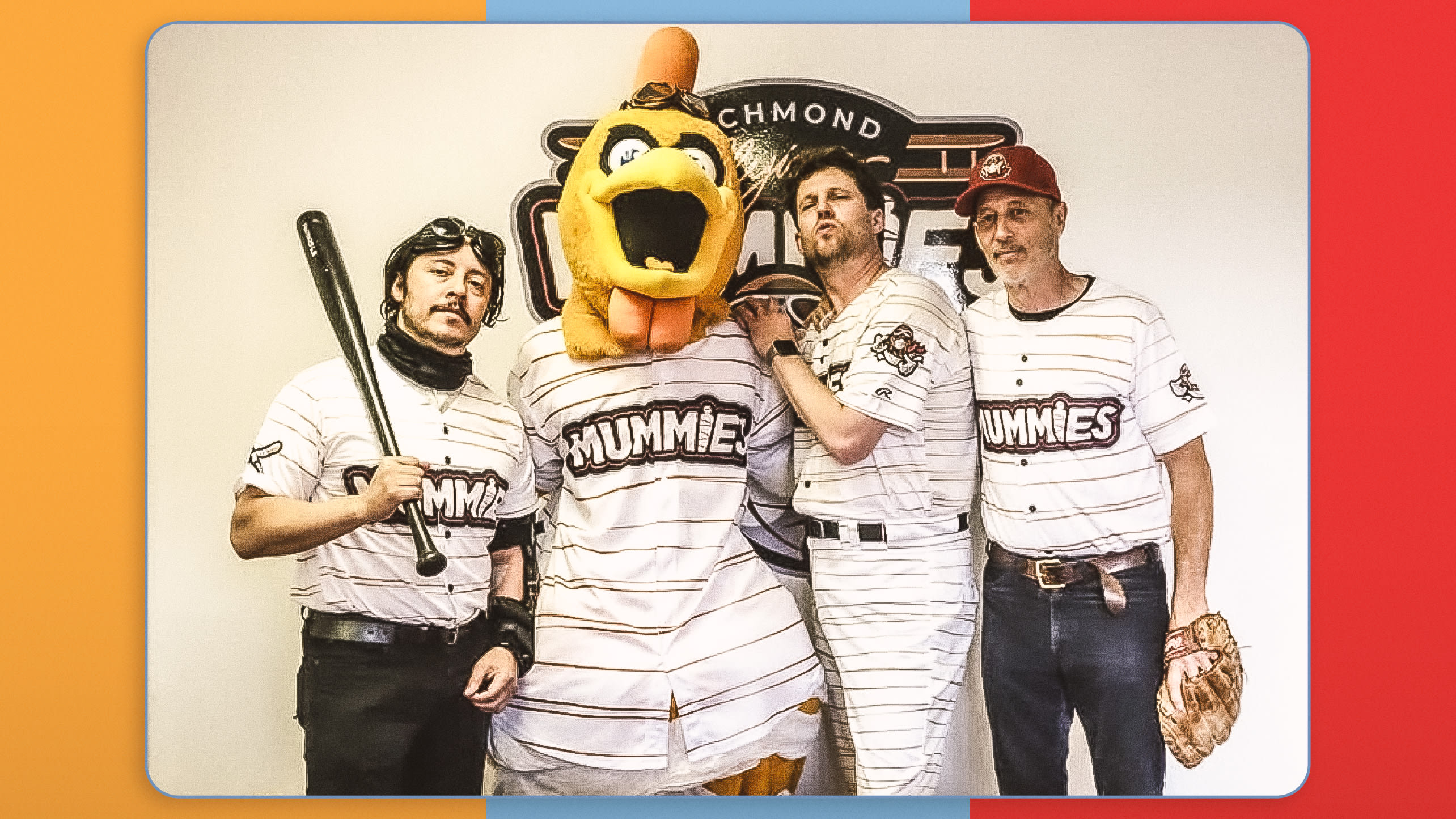 Efran Ramirez, Jon Heder and Jon Gries wear jerseys of the Richmond Flying Mummies while posing with the mascot