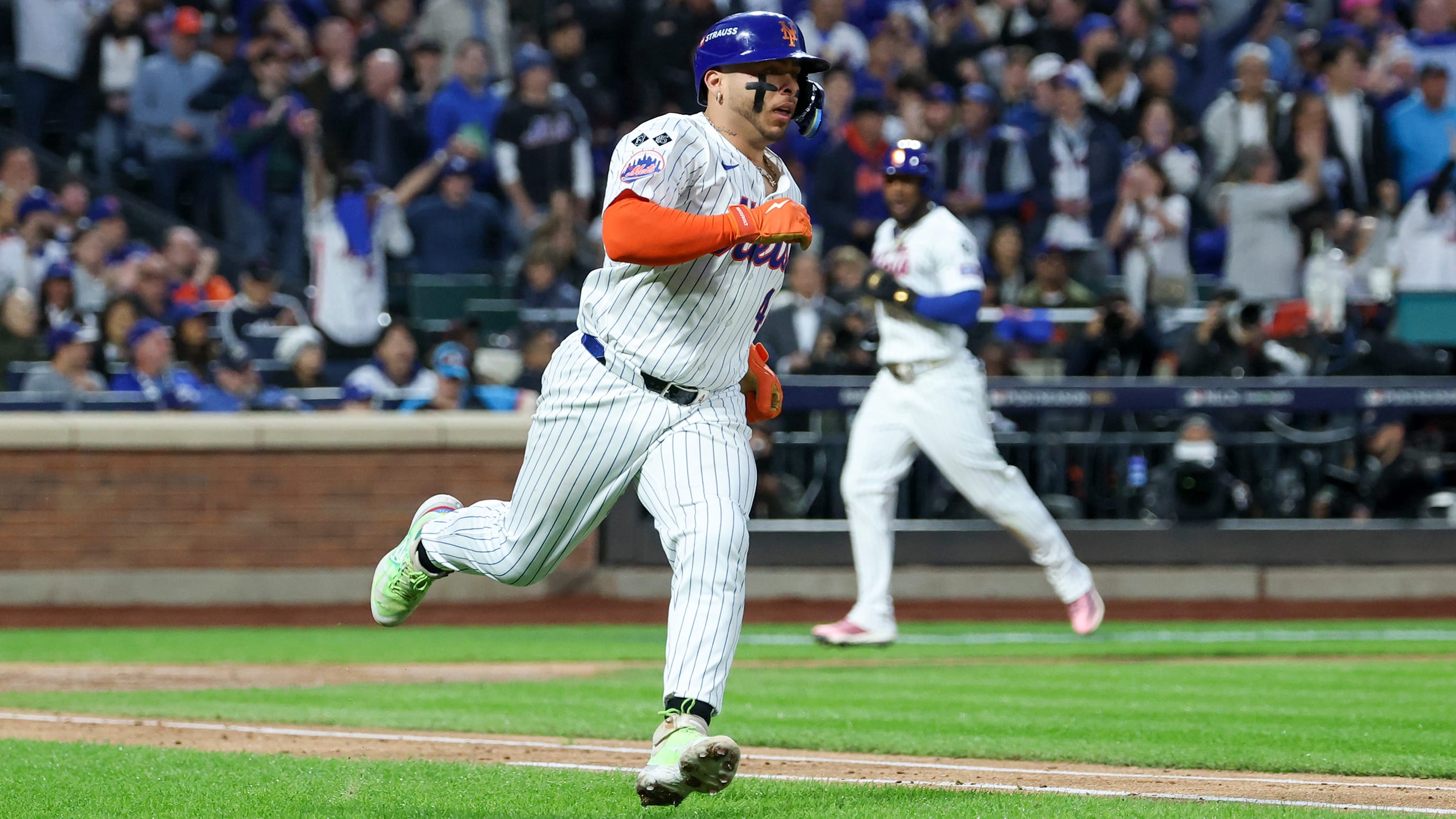 Francisco Alvarez heads to first base after hitting an RBI single in Game 5