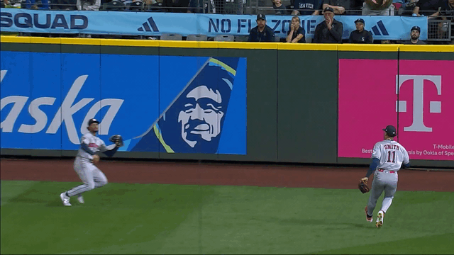 An animated gif of Brice Matthews making a sliding catch in center field