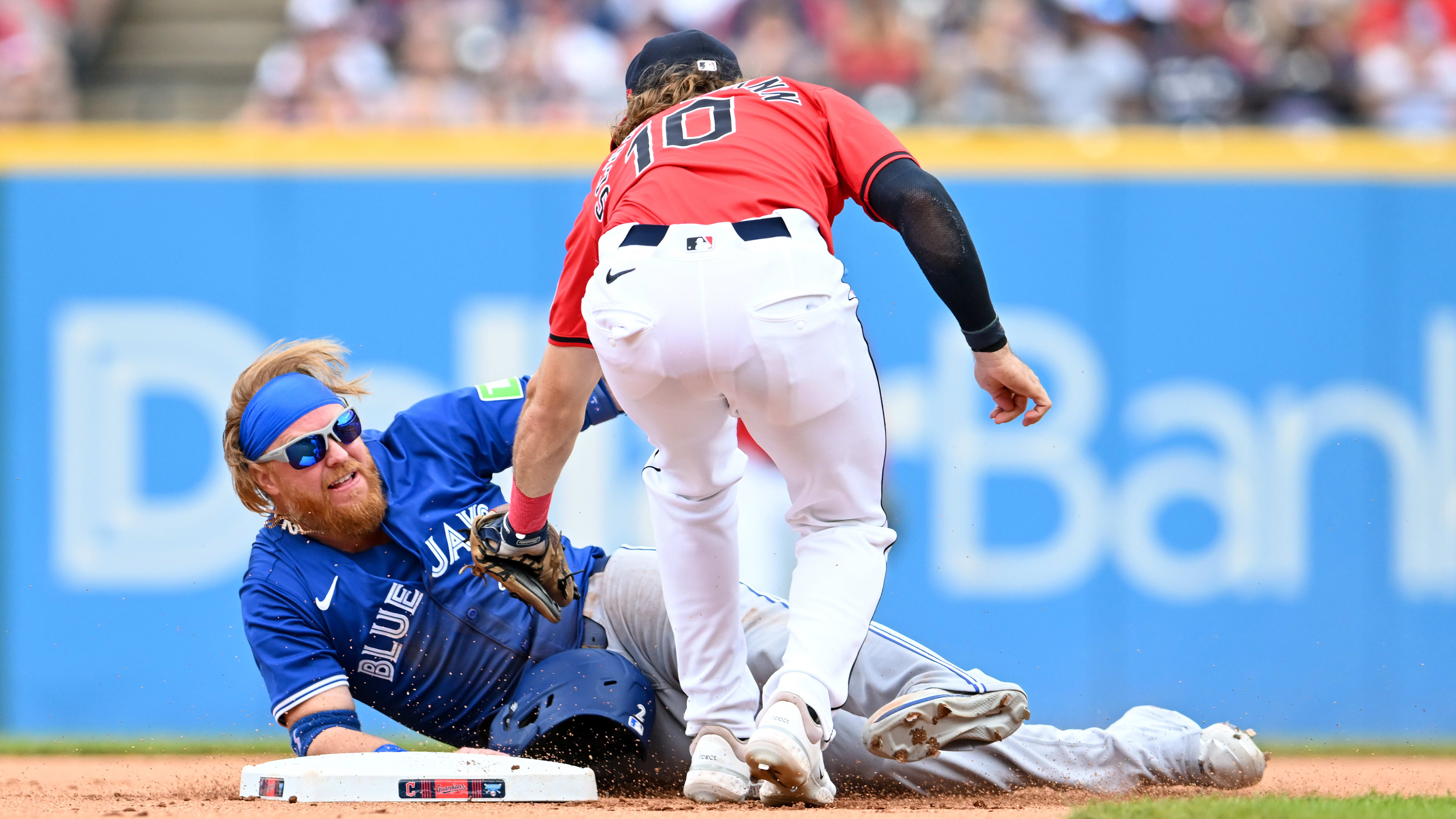 Justin Turner is safe at second base