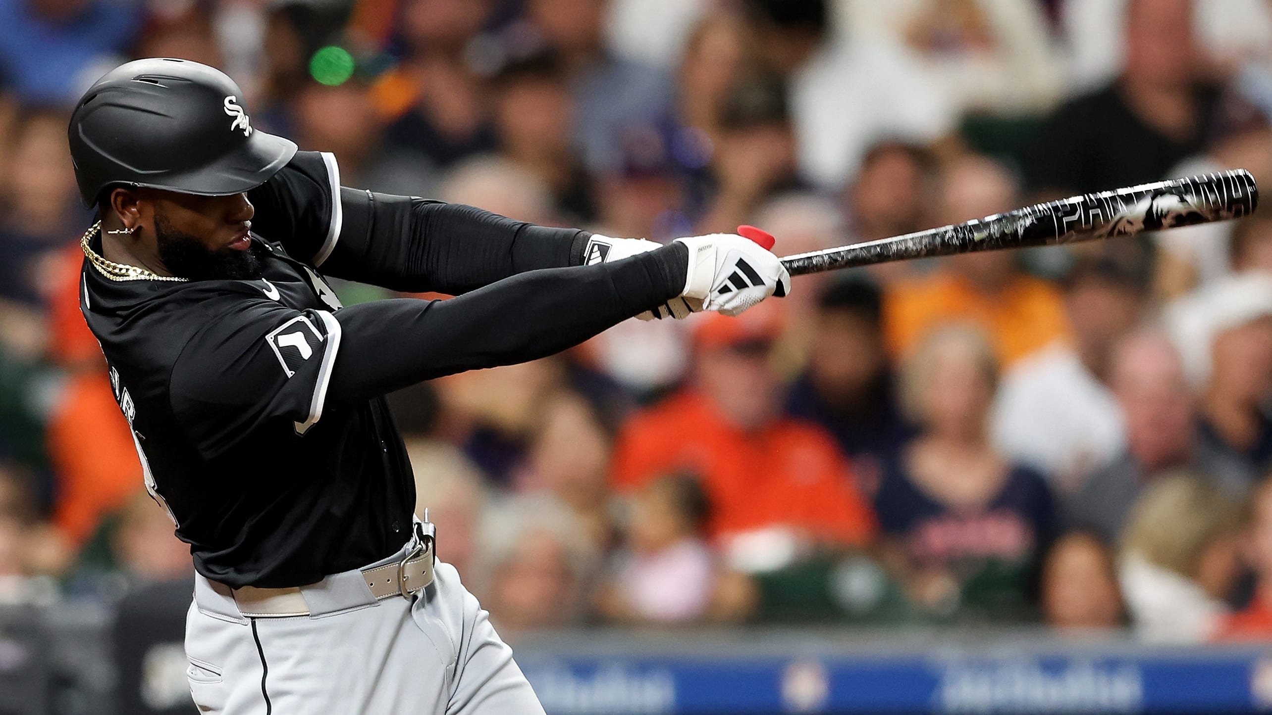 Luis Robert Jr. swings the bat