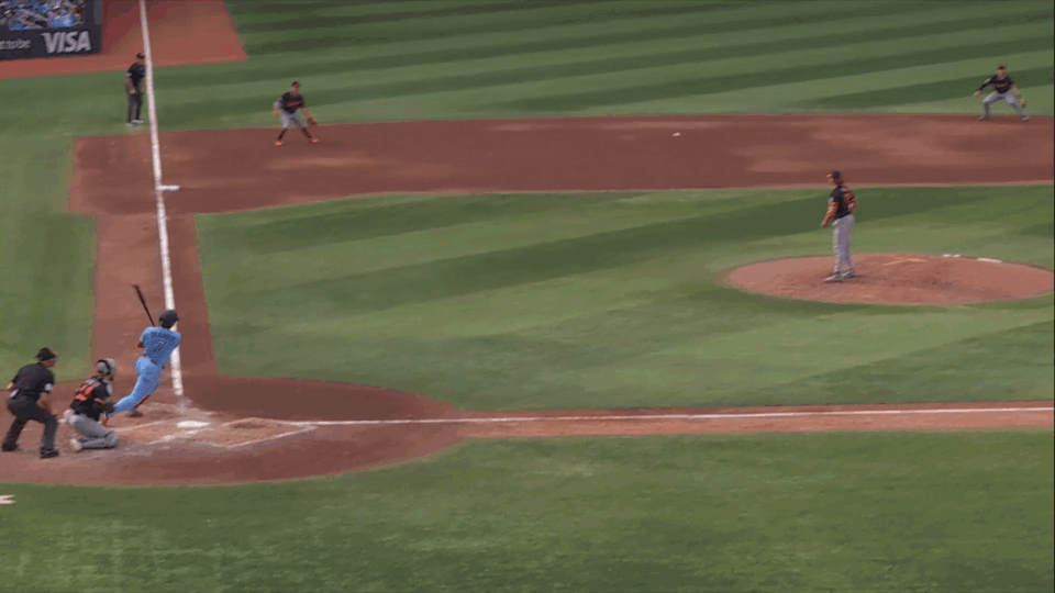 An animated gif of John Peck starting a 6-4-3 inning-ending double play