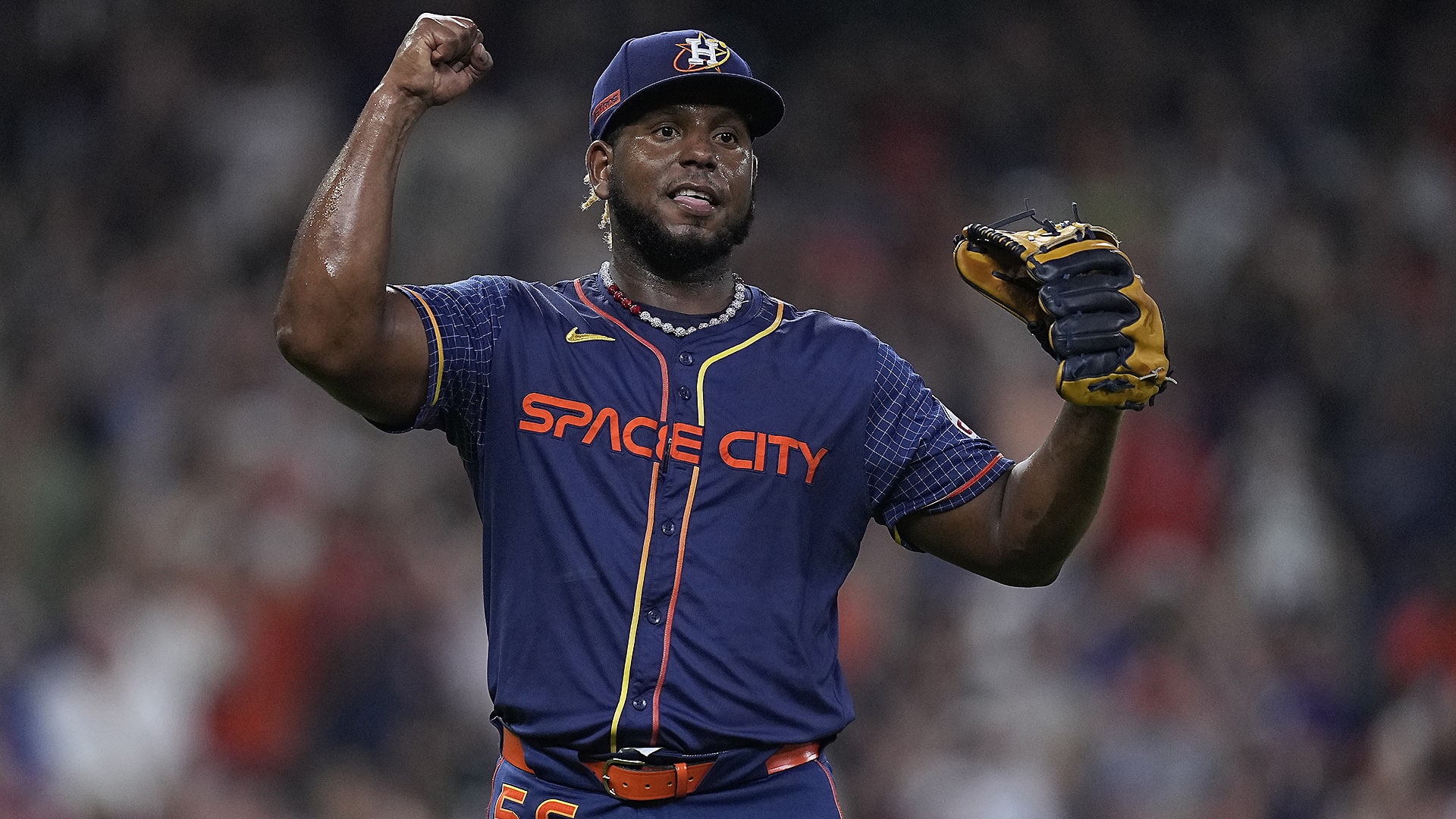 Ronel Blanco raises his arms in celebration as the final out is recorded
