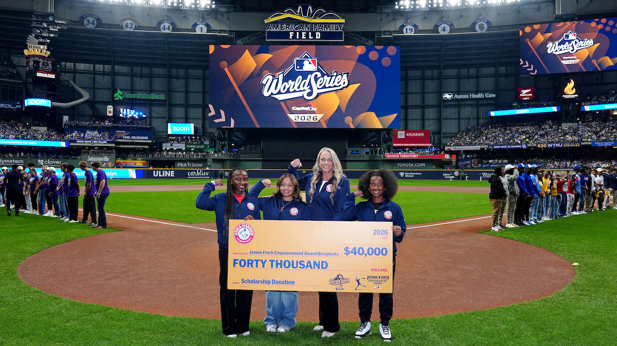 Jennie Finch with young softball players before Game 2 of the World Series