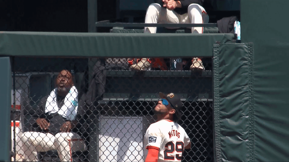 An animated GIF of Luis Matos making a leaping catch