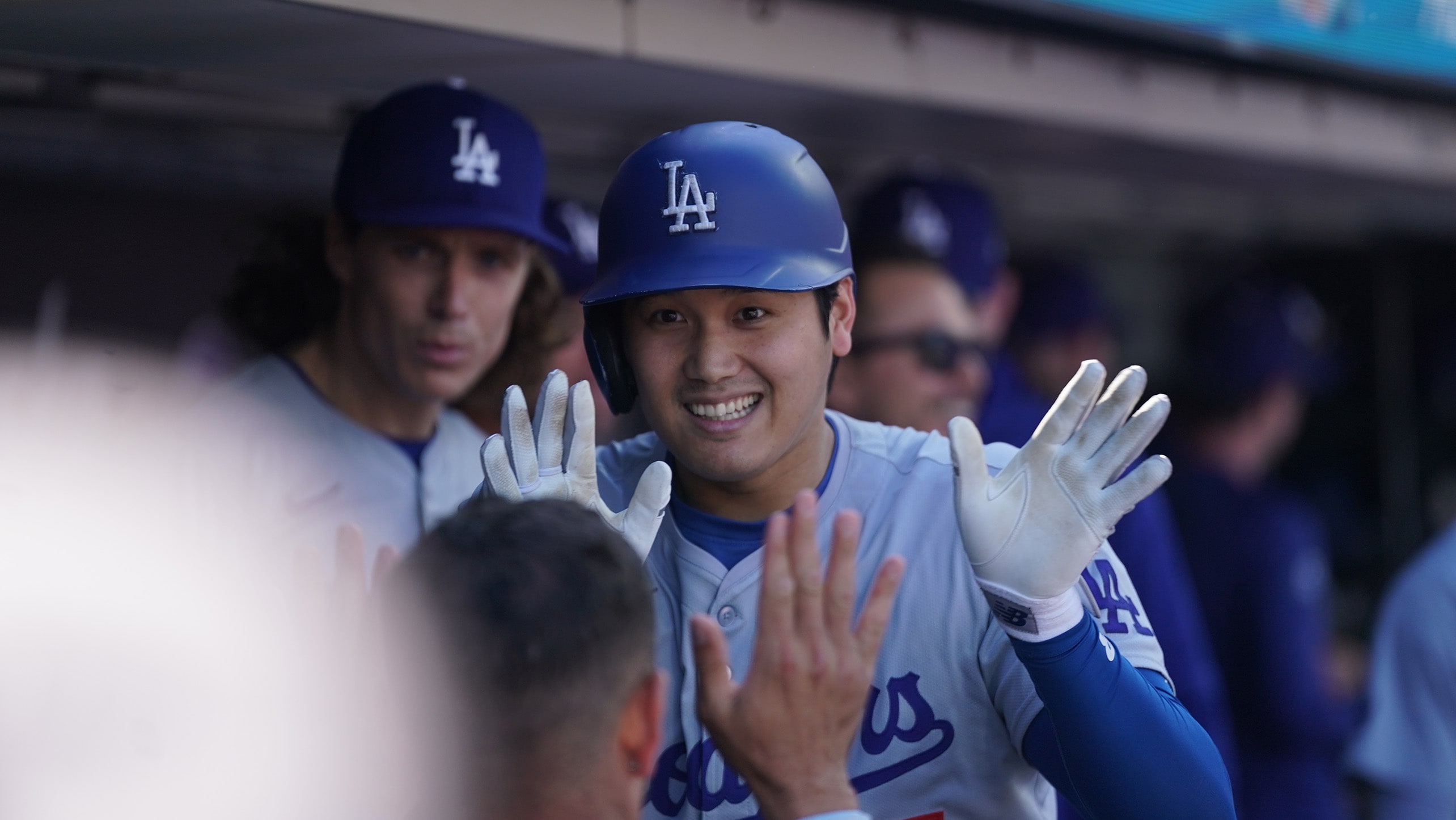 Shohei Ohtani celebrating in the dugout