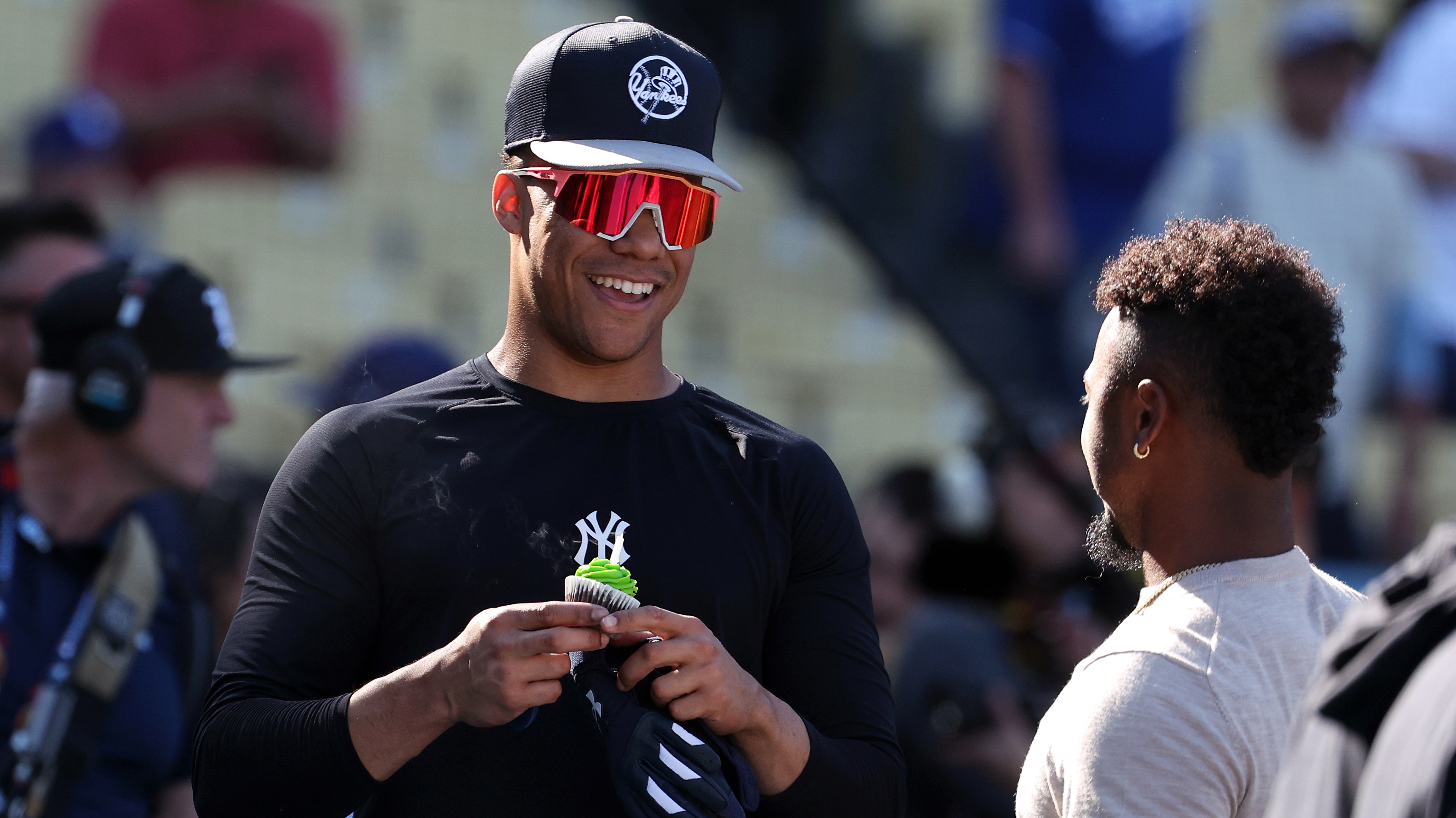 Juan Soto gets a birthday cupcake from Ozzie Albies