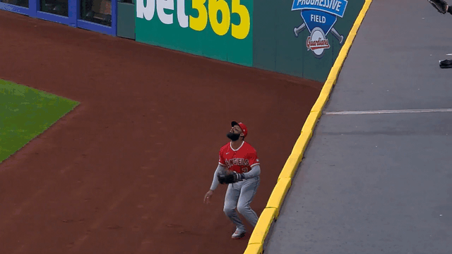 An animated gif of Jo Adell leaping to rob a home run in Cleveland