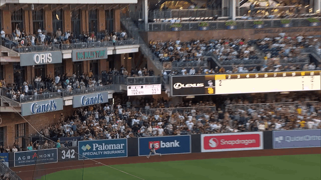 An animated gif of Jordan Beck robbing a home run