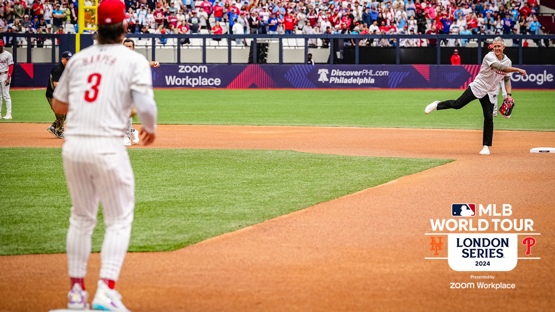 Chase Utley turns a double play with Bryce Harper