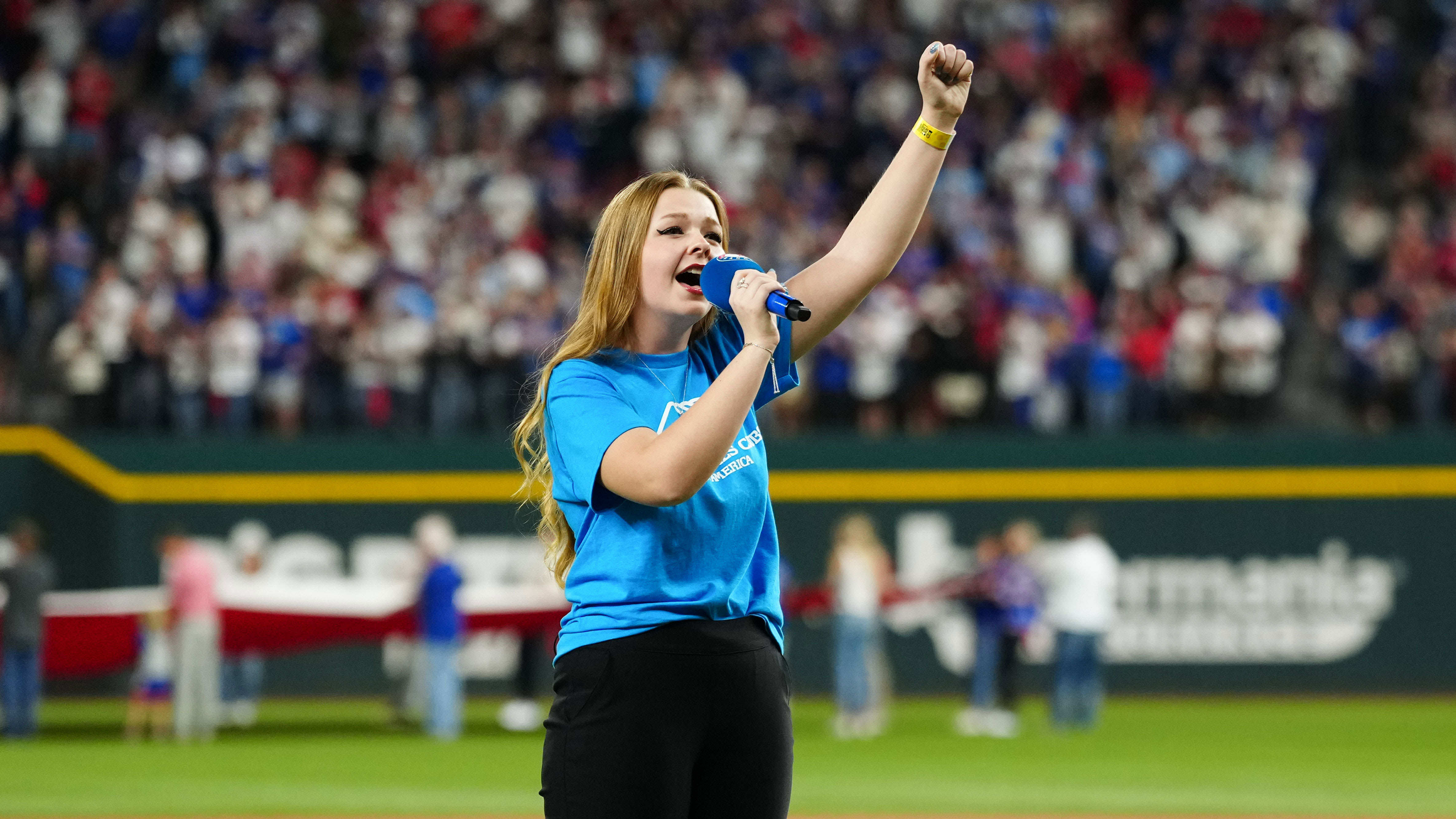 Pearle Peterson sings the national anthem