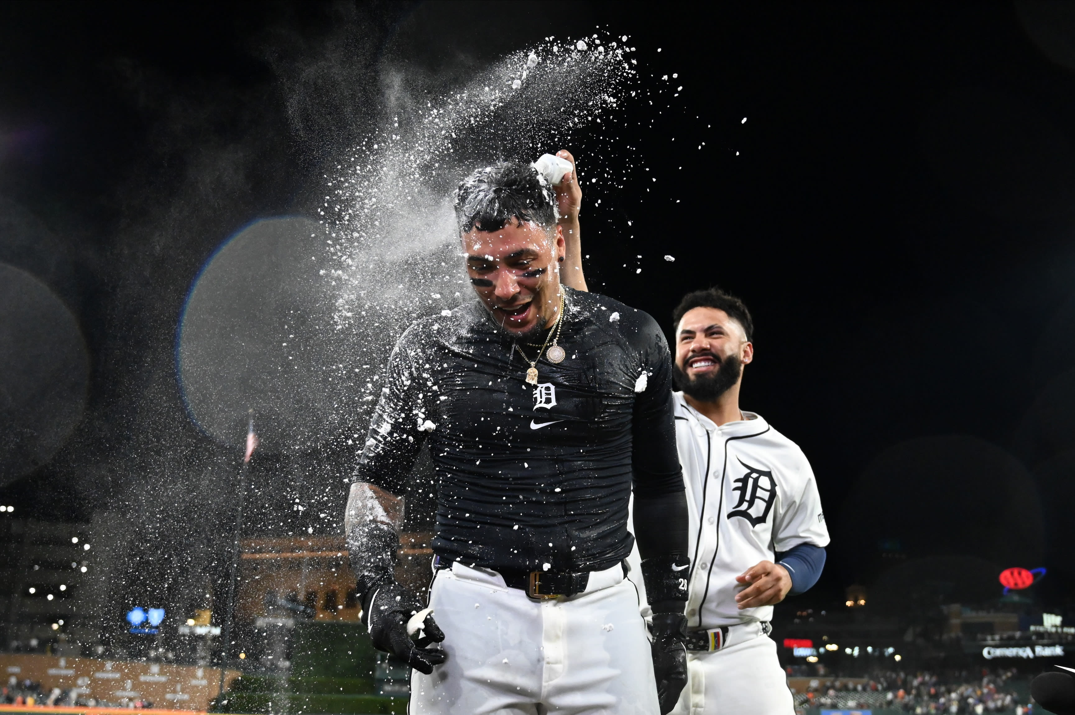 Javier Báez celebrates after his walk-off home run