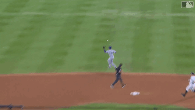 An animated gif of a Mookie Betts relay throw home for the out