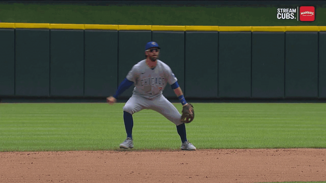 An animated gif of Dansby Swanson making a diving catch