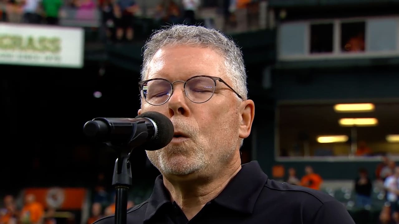 Chris Ullman performs the national anthem