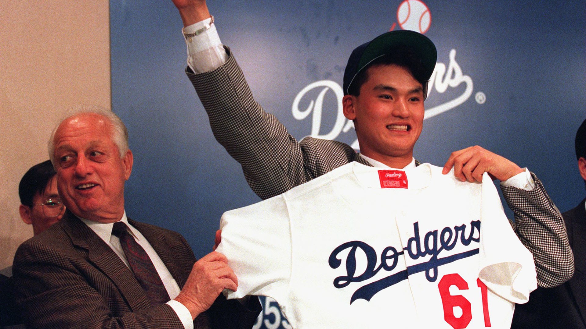 Chan Ho Park holding his Dodgers uniform