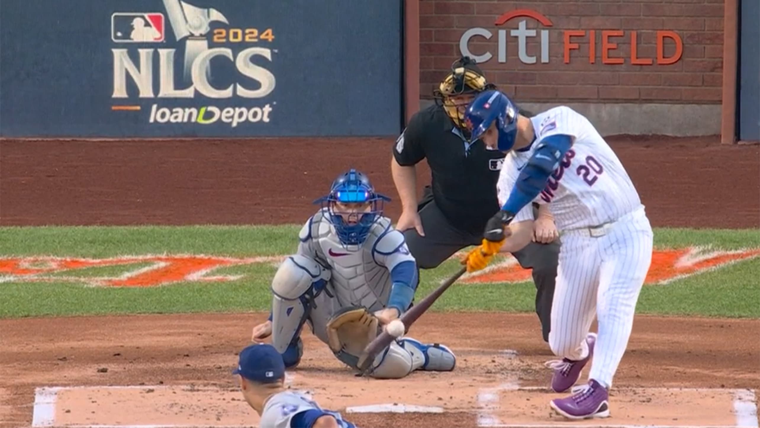 Pete Alonso gets his bat on a low pitch for a home run