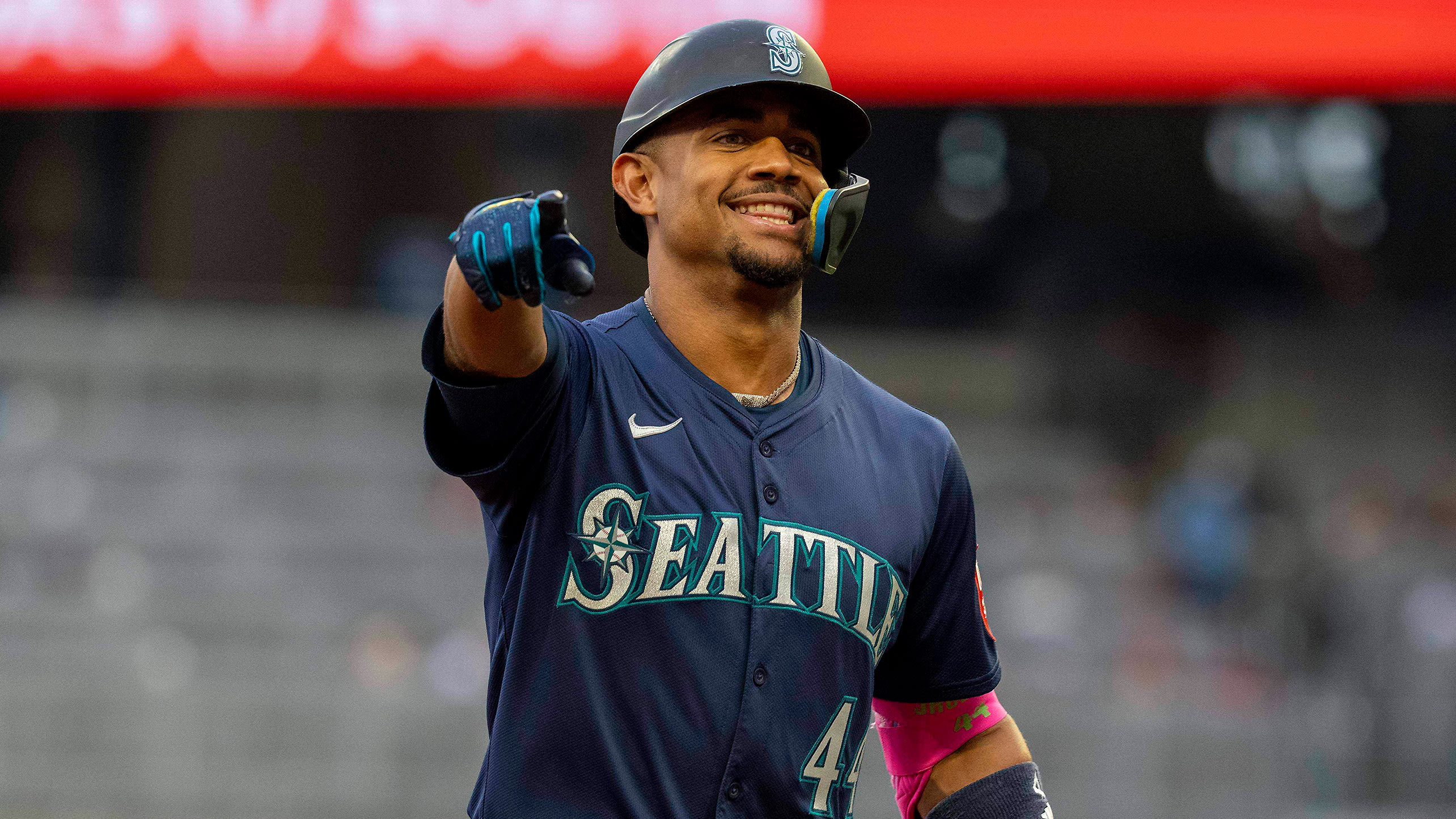 Julio Rodríguez celebrates after his first home run of the game