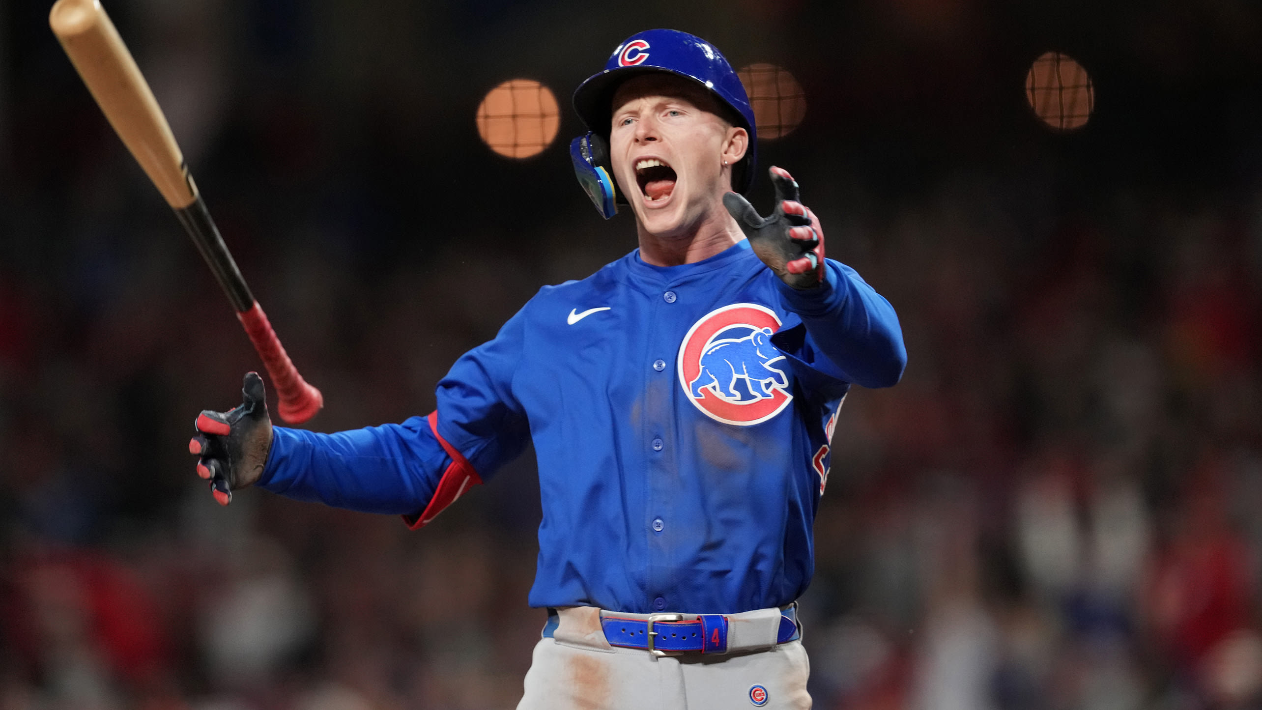 Pete Crow-Armstrong tosses his bat away and lets out a yell after hitting a grand slam