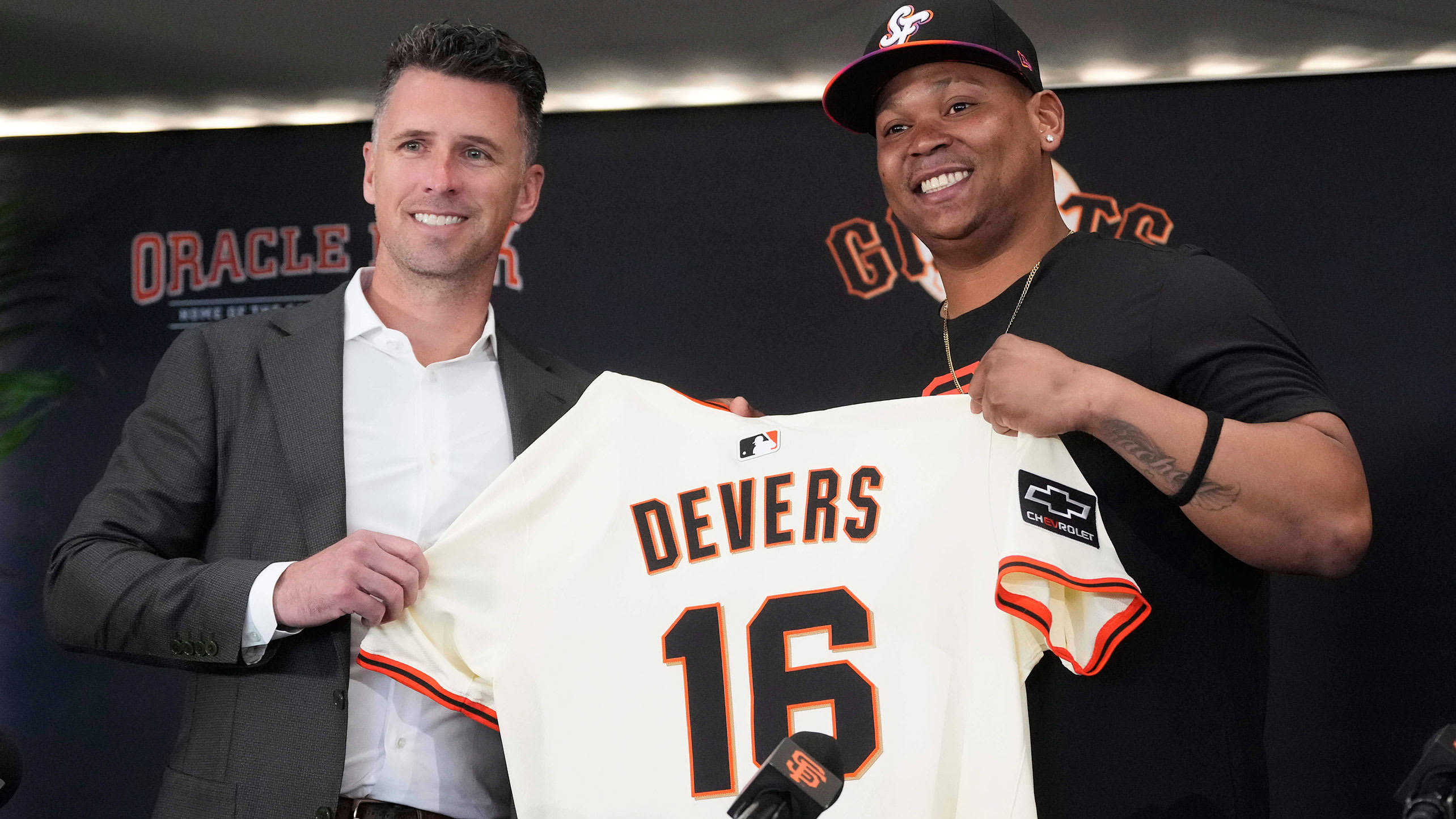 Buster Posey and Rafael Devers