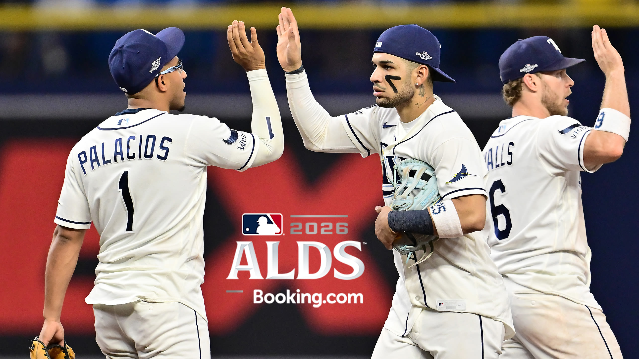 Richie Palacios, Victor Mesa Jr. and Taylor Walls celebrate after the Rays' win in ALDS Game 2
