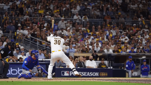 An animated gif of Gavin Sheets hitting a home run and gesturing toward the Padres' dugout
