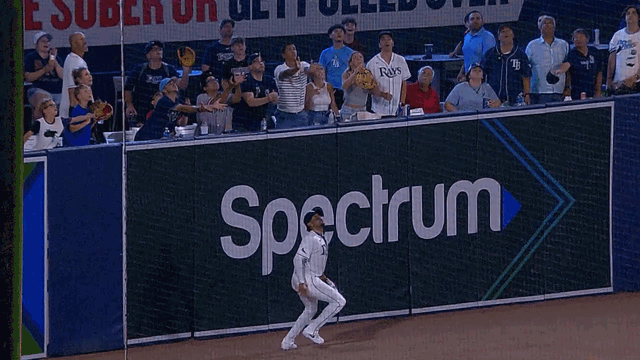 An animated gif of Christopher Morel leaping to rob a home run