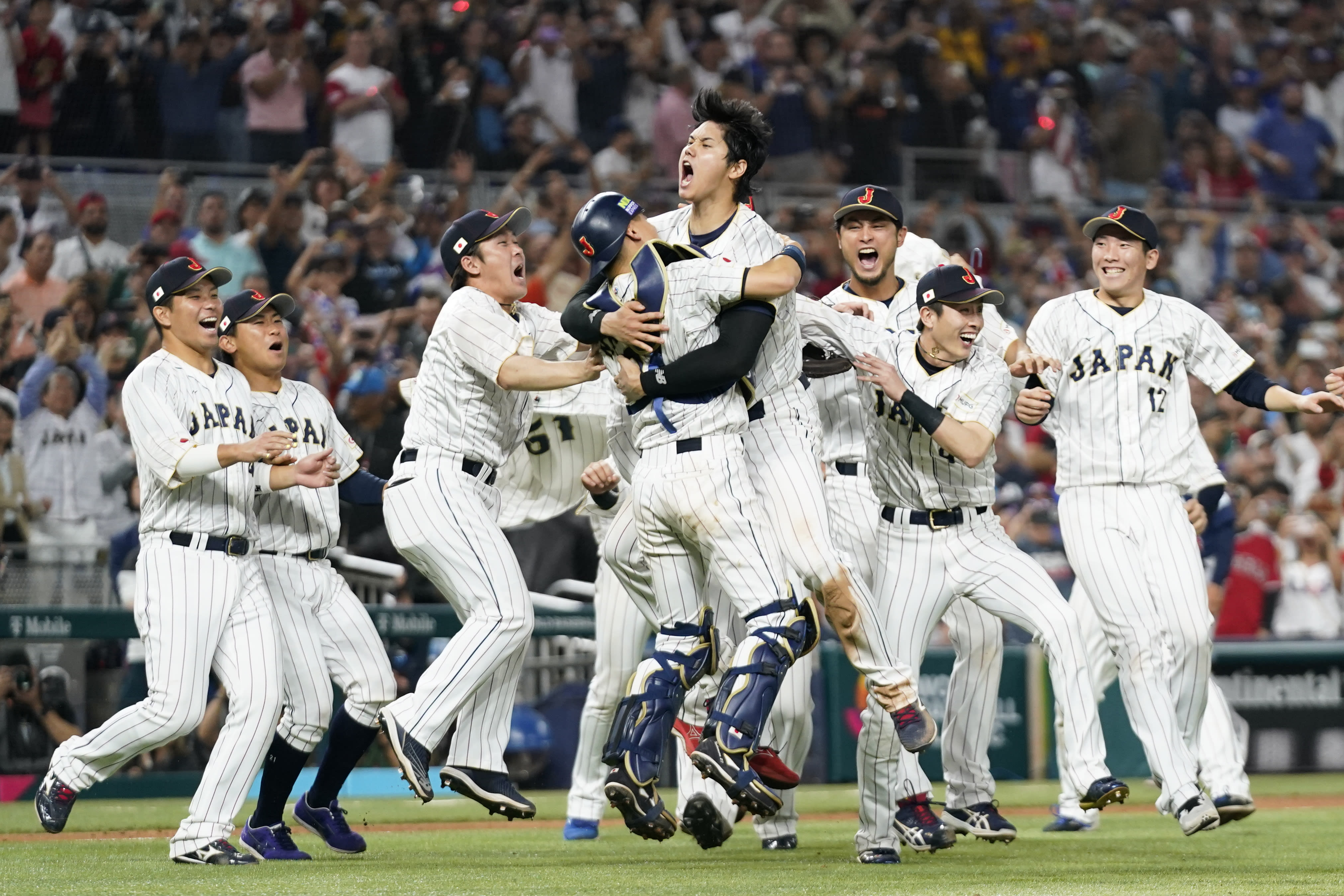 Shohei Ohtani celebrates Japan winning the 2023 World Baseball Classic