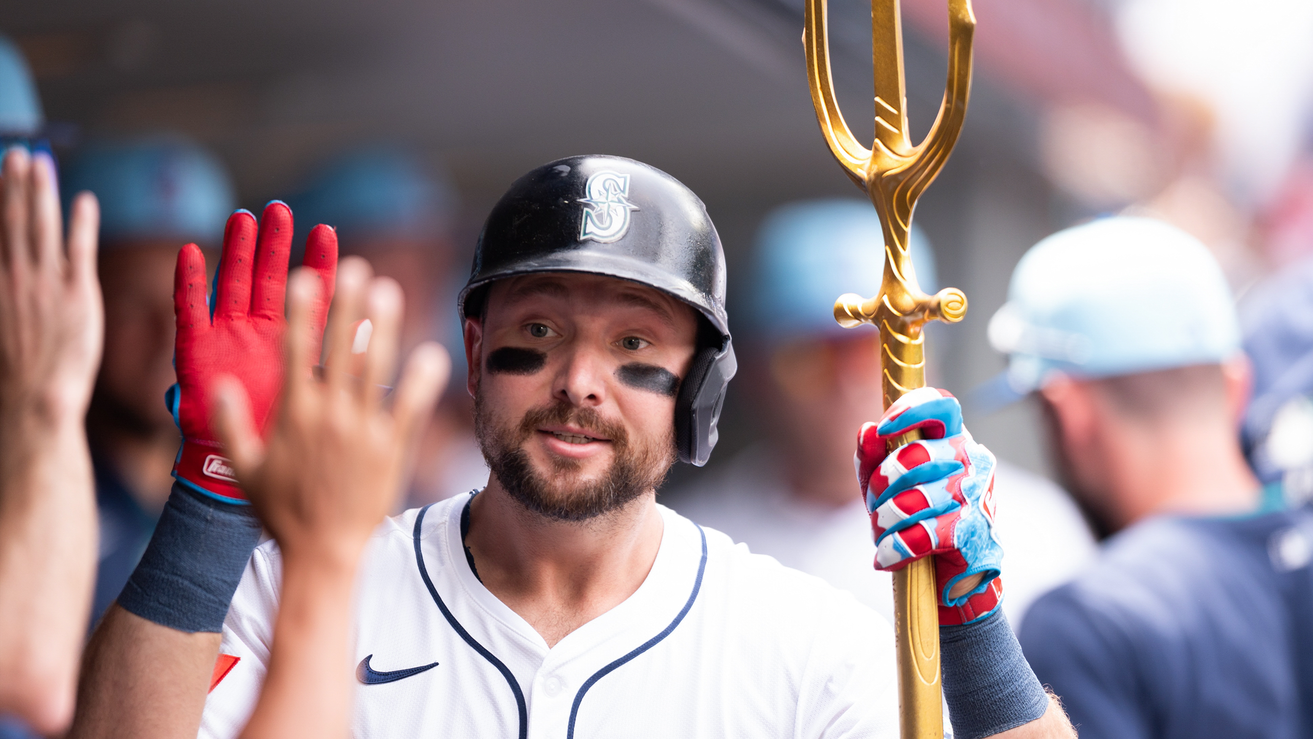 Cal Raleigh with the Mariners' home run trident