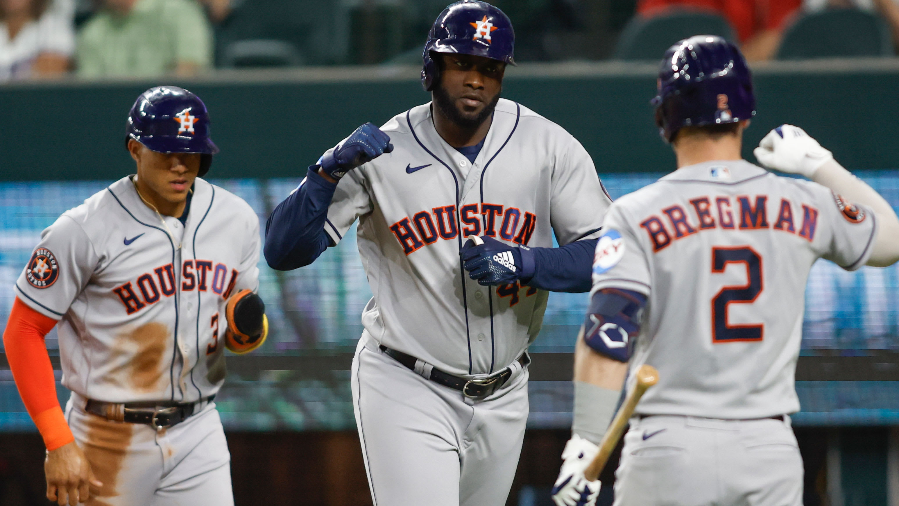 Jeremy Peña, Yordan Alvarez and Alex Bregman celebrate a home run on the road